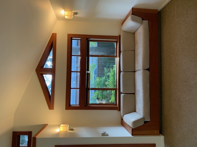 Built-in window seat under the gable window